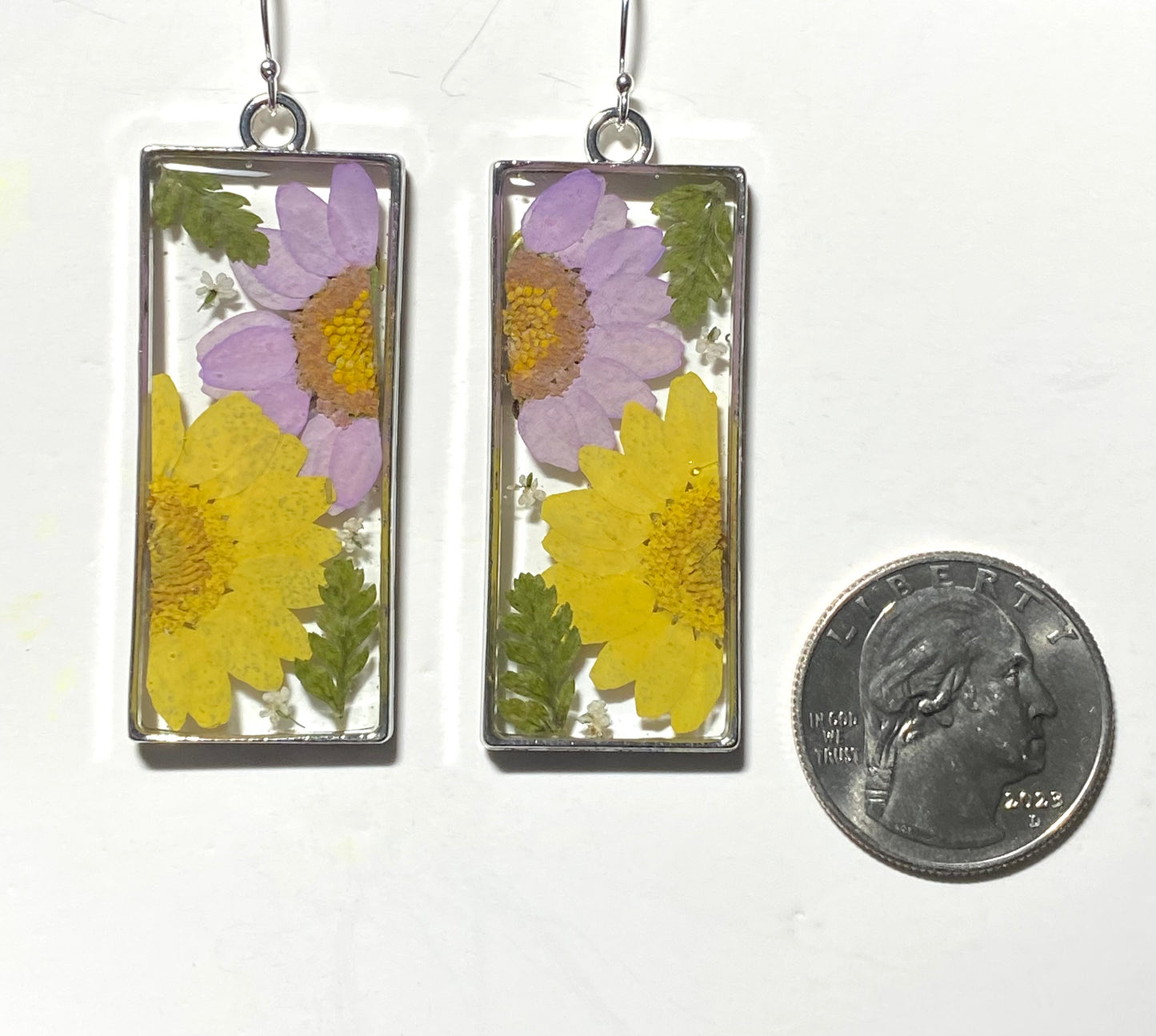 Split Yellow and Purple Daisies with pieces of Queen Anne’s Lace and Fern