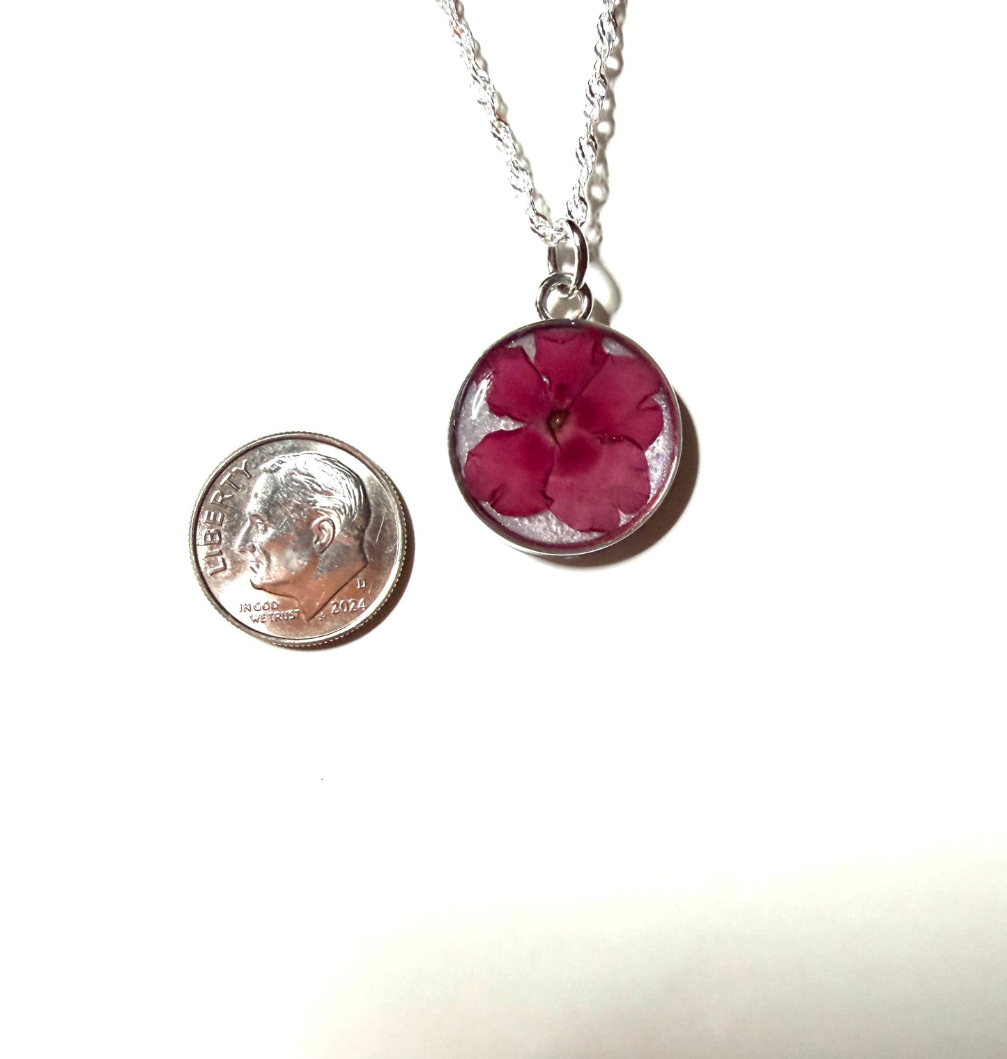 Opal Colored Mica Powder with a Red Verbena on top