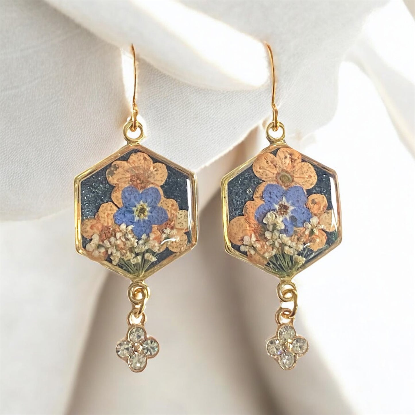 Black Colored Mica Powder with Queen Anne’s Lace, Orange Plum Blossoms, and Blue Forget-Me-Nots with a Rhinestone Charm