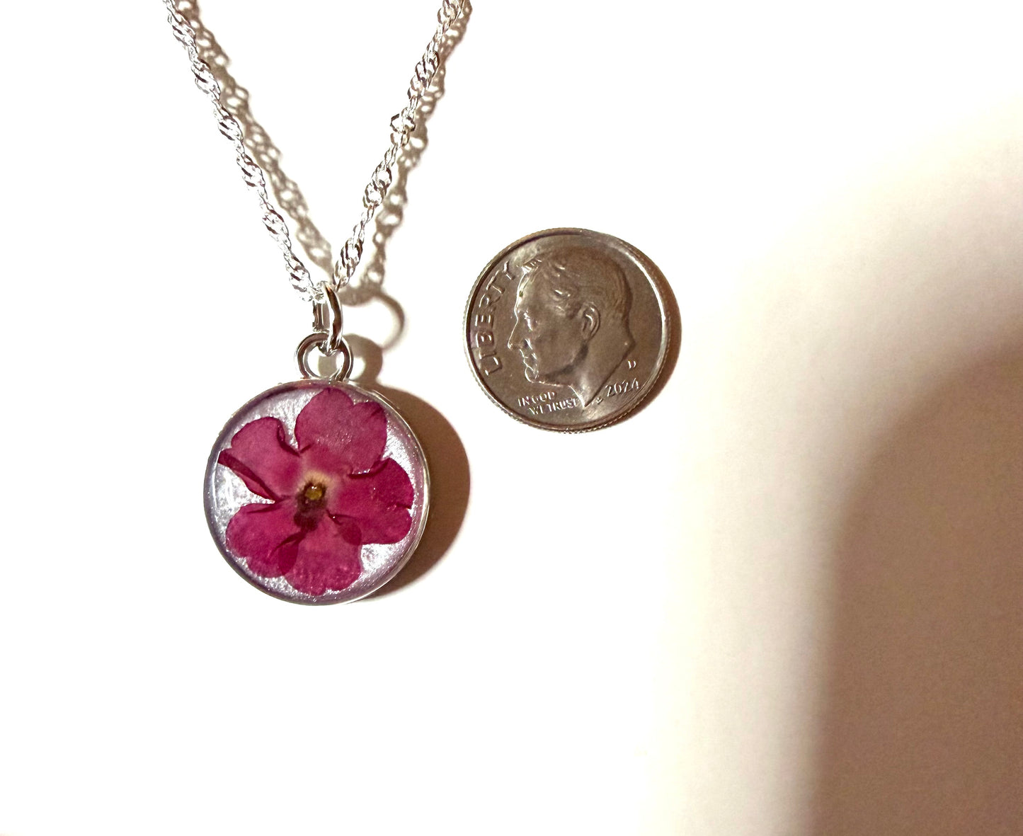 Opal Colored Mica Powder with a Red Verbena on top