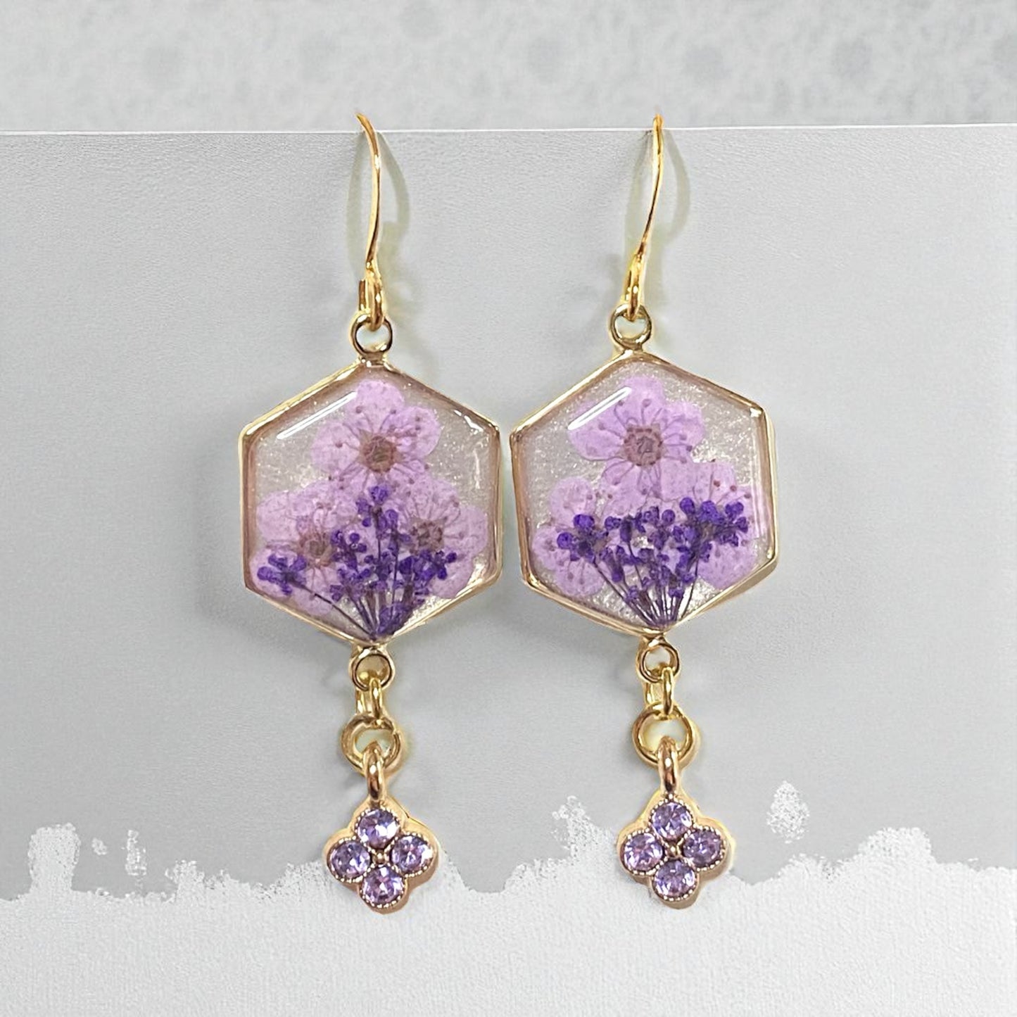 Opal/white Colored Mica Powder with Purple Queen Anne’s Lace, Light Purple Plum Blossoms with a Purple Rhinestone Charm