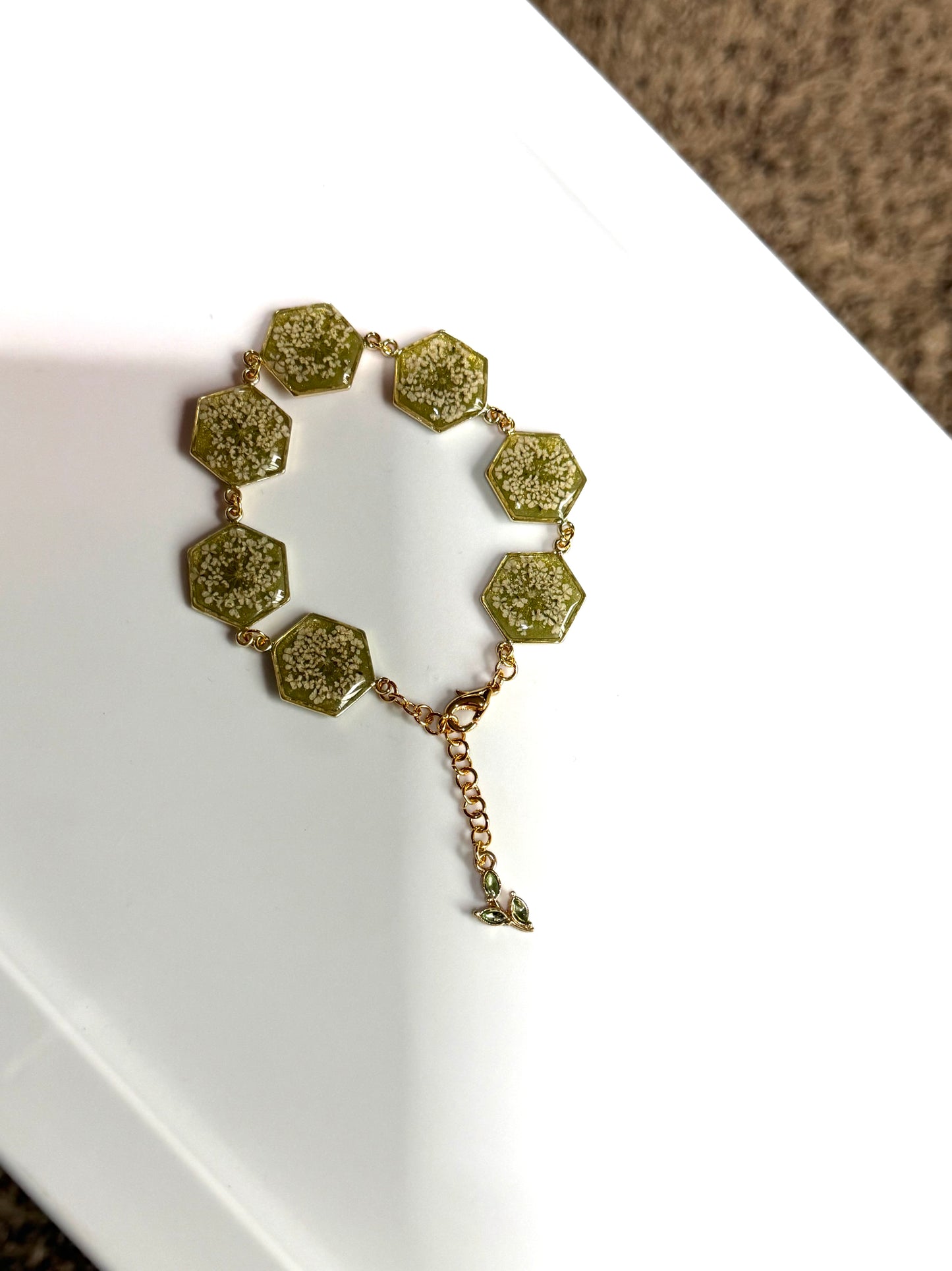 Gold Colored Bracelet with Green Mica Powder and Queen Anne’s Lace