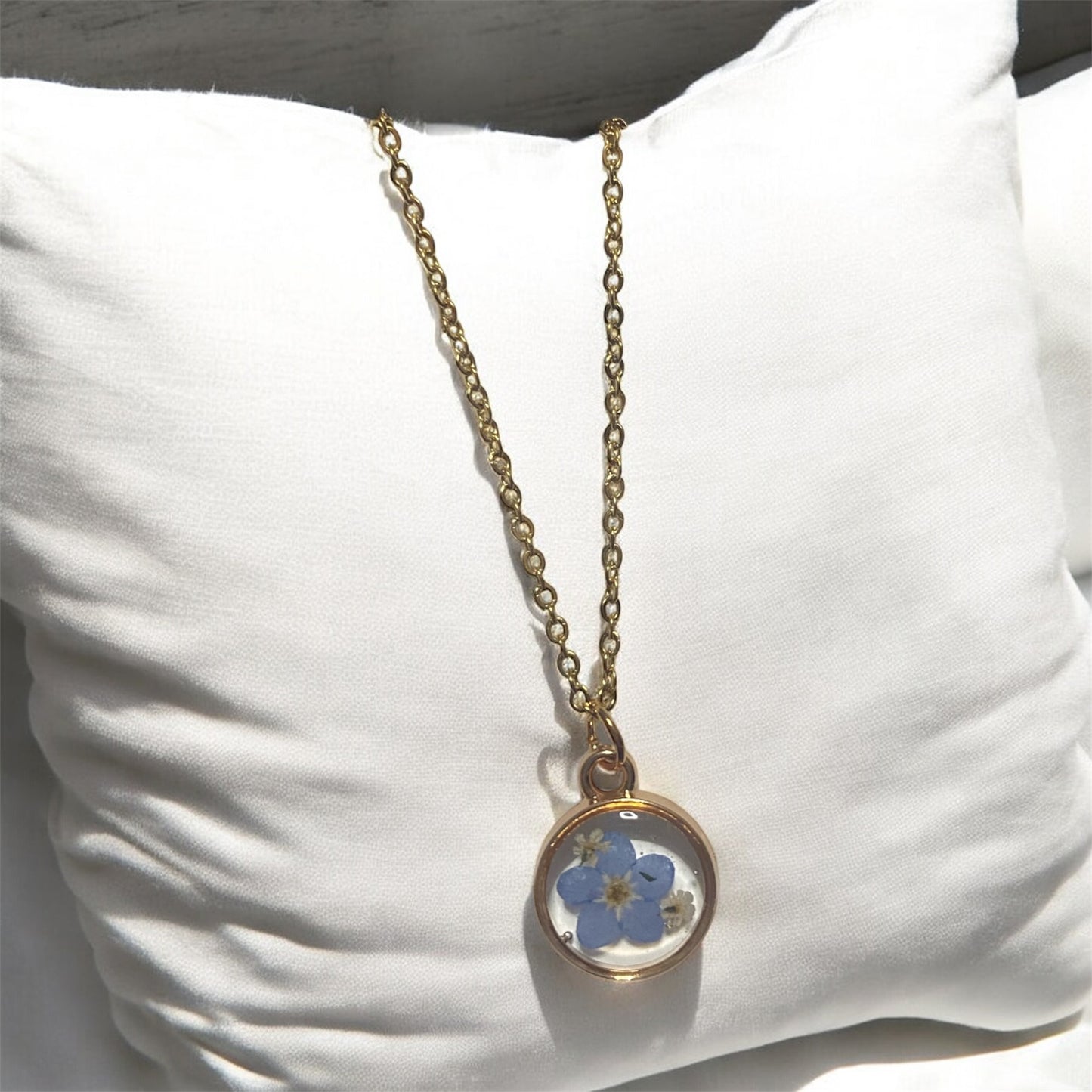 Dainty Rose Gold Bezel with Blue Forget-Me-Nots and Pieces of Queen Anne’s Lace on a Brass chain