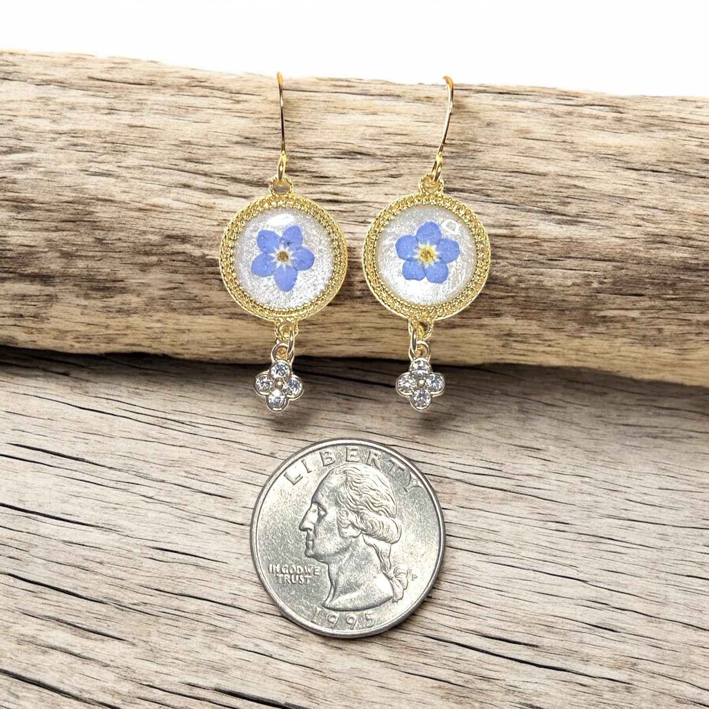 Opal/White Colored Mica Powder with Blue Forget-Me-Nots and a Rhinestone Charm