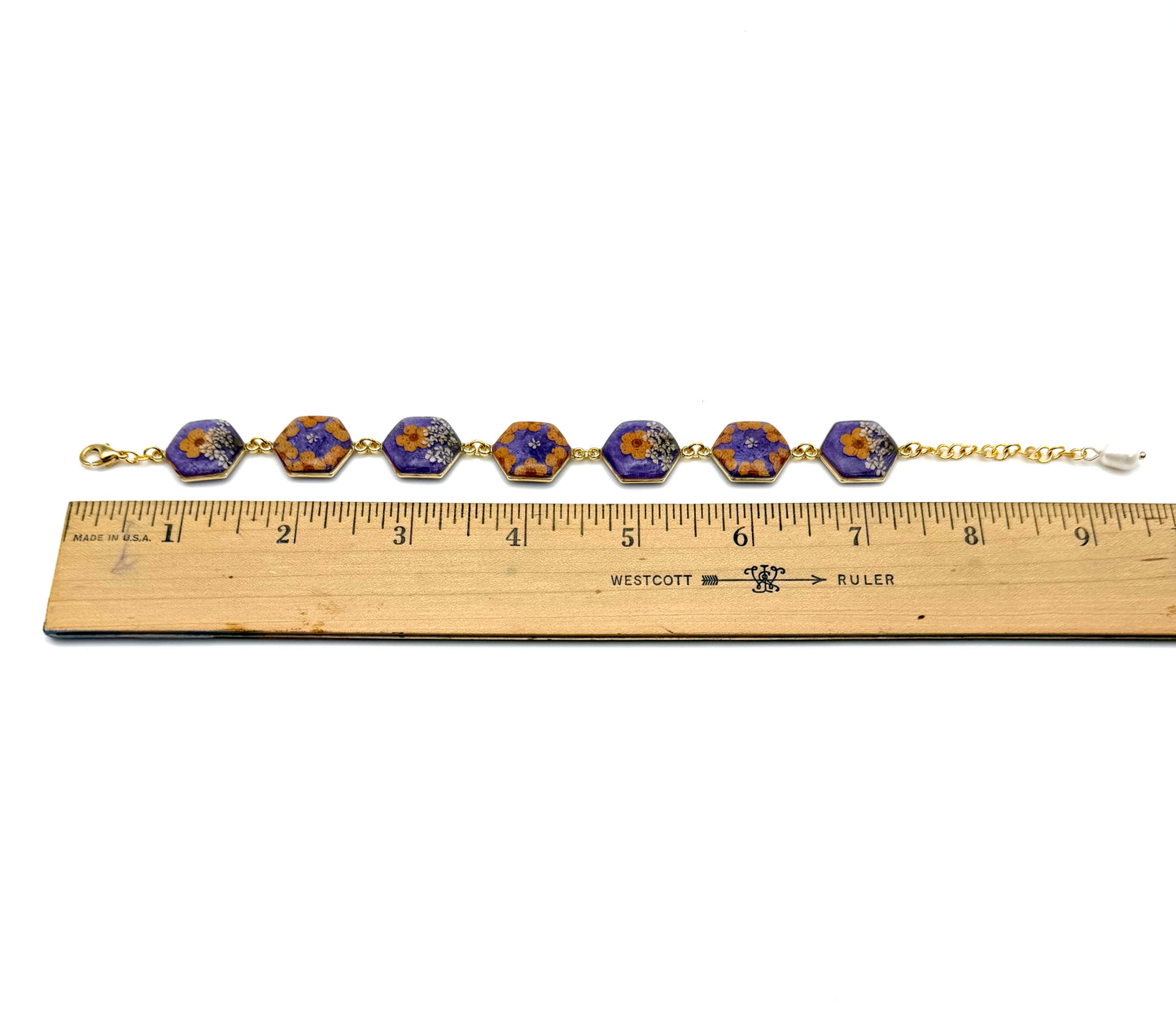 Gold Colored Bracelet with Blue Colored Mica Powder, Orange Plum Blossoms and Queen Anne’s Lace