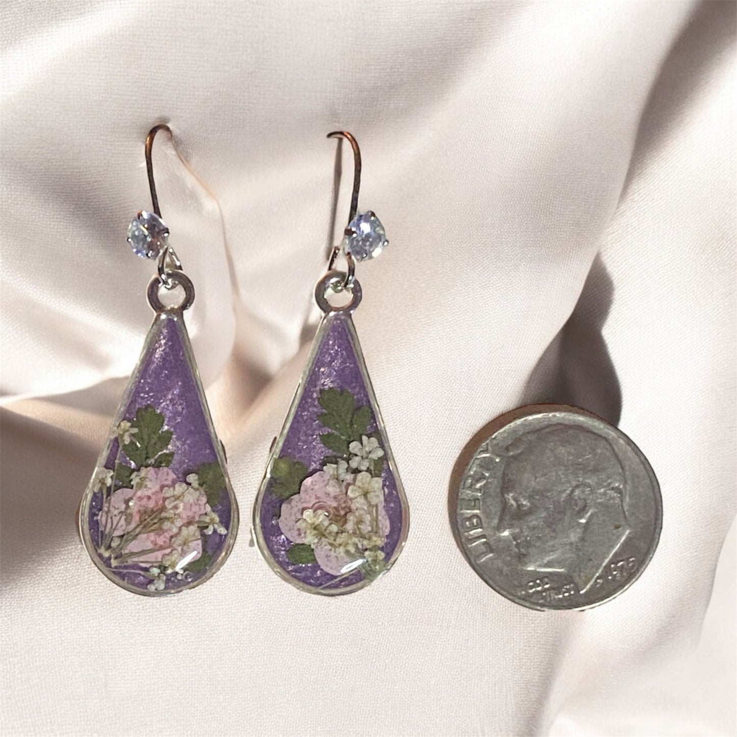 Purple Mica Powder with Light Pink Plum Blossoms, Dry Pressed Fern, and Pieces of Queen Anne’s Lace