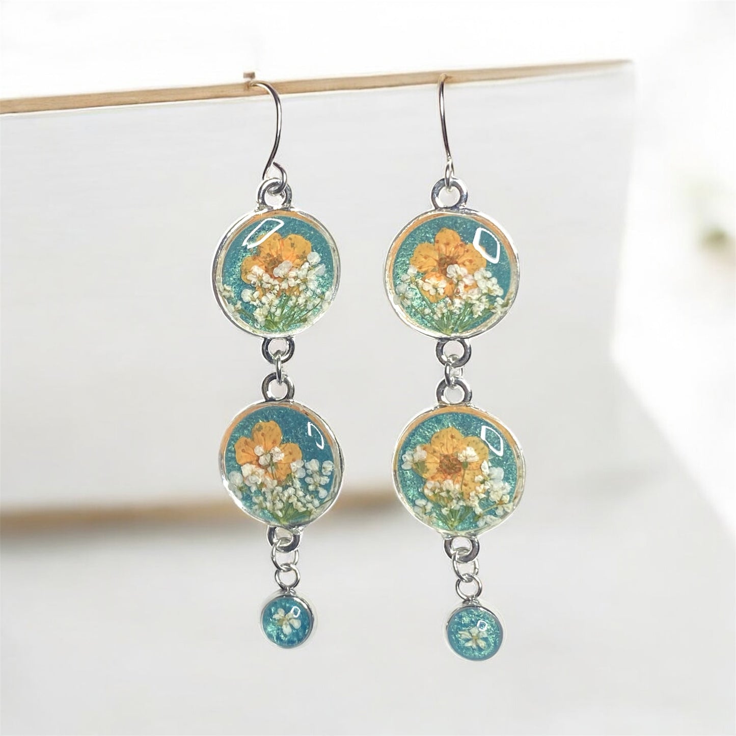 Teal Colored Mica Powder Dangle Earrings with Orange Plum Blossoms and Queen Anne’s Lace