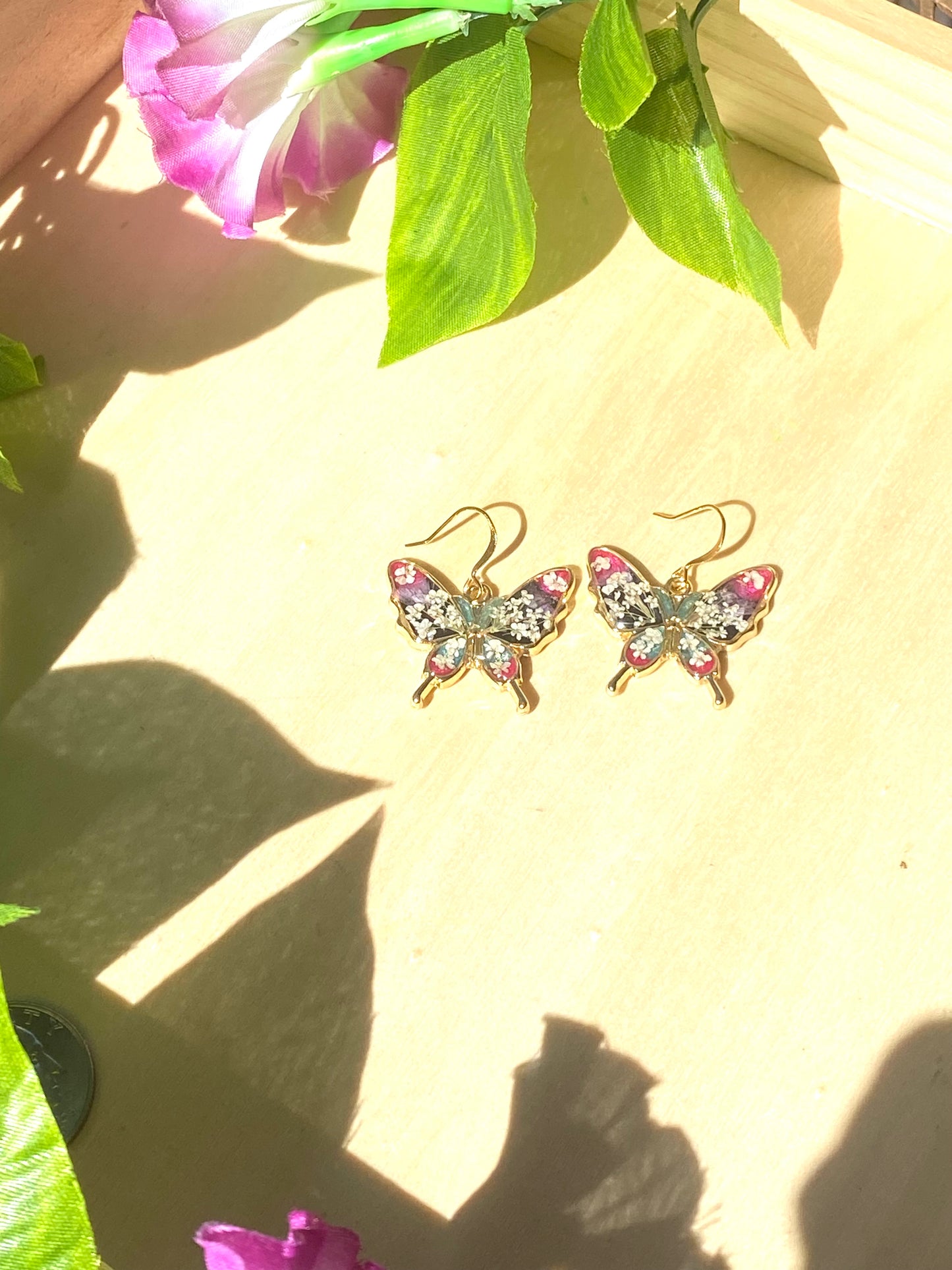 Butterfly Bezels filled with Mica Powder pieces of Queen Anne’s Lace,and  Purple Wild Flowers