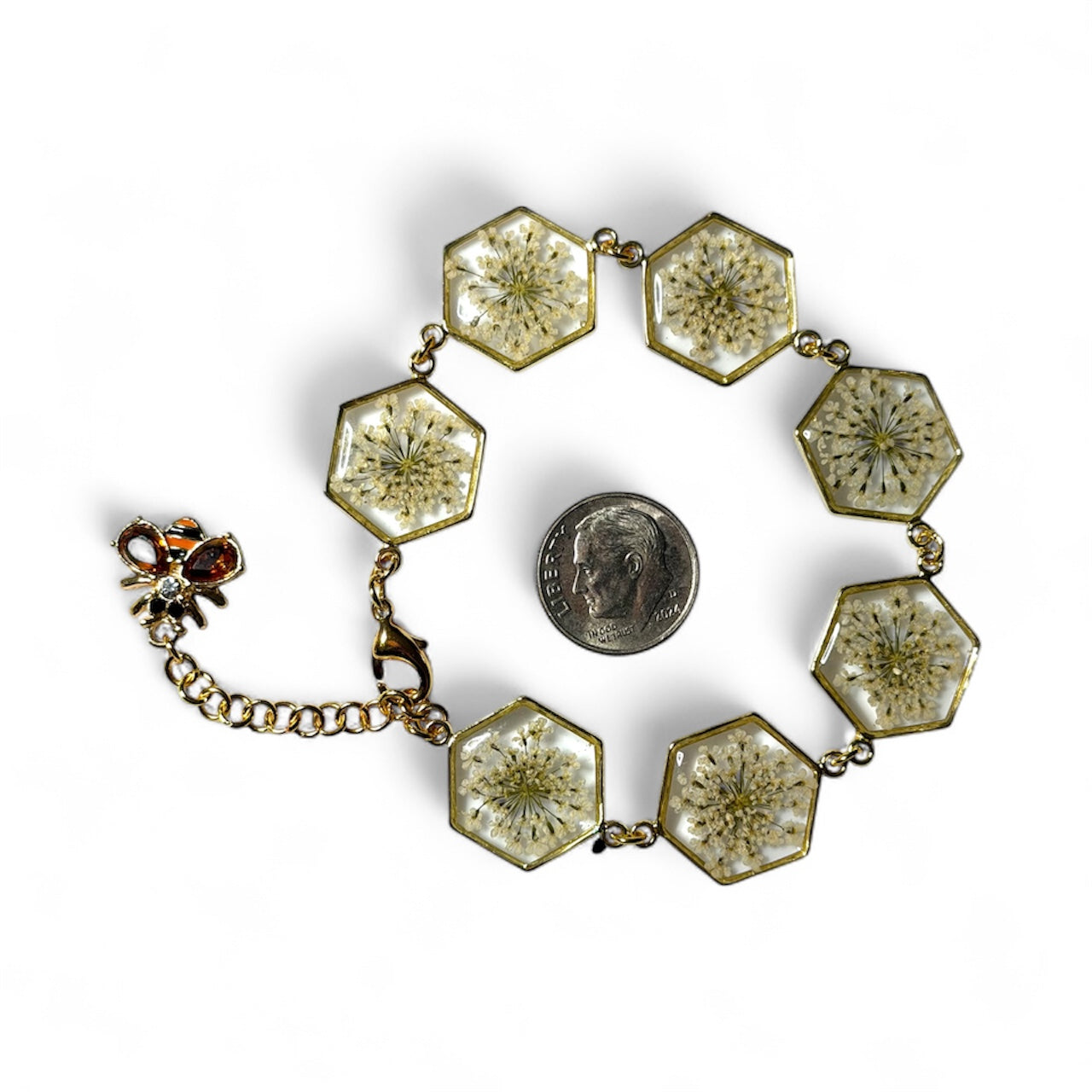 Gold Colored Bracelet with Queen Anne’s Lace and a Queen Bee Charm