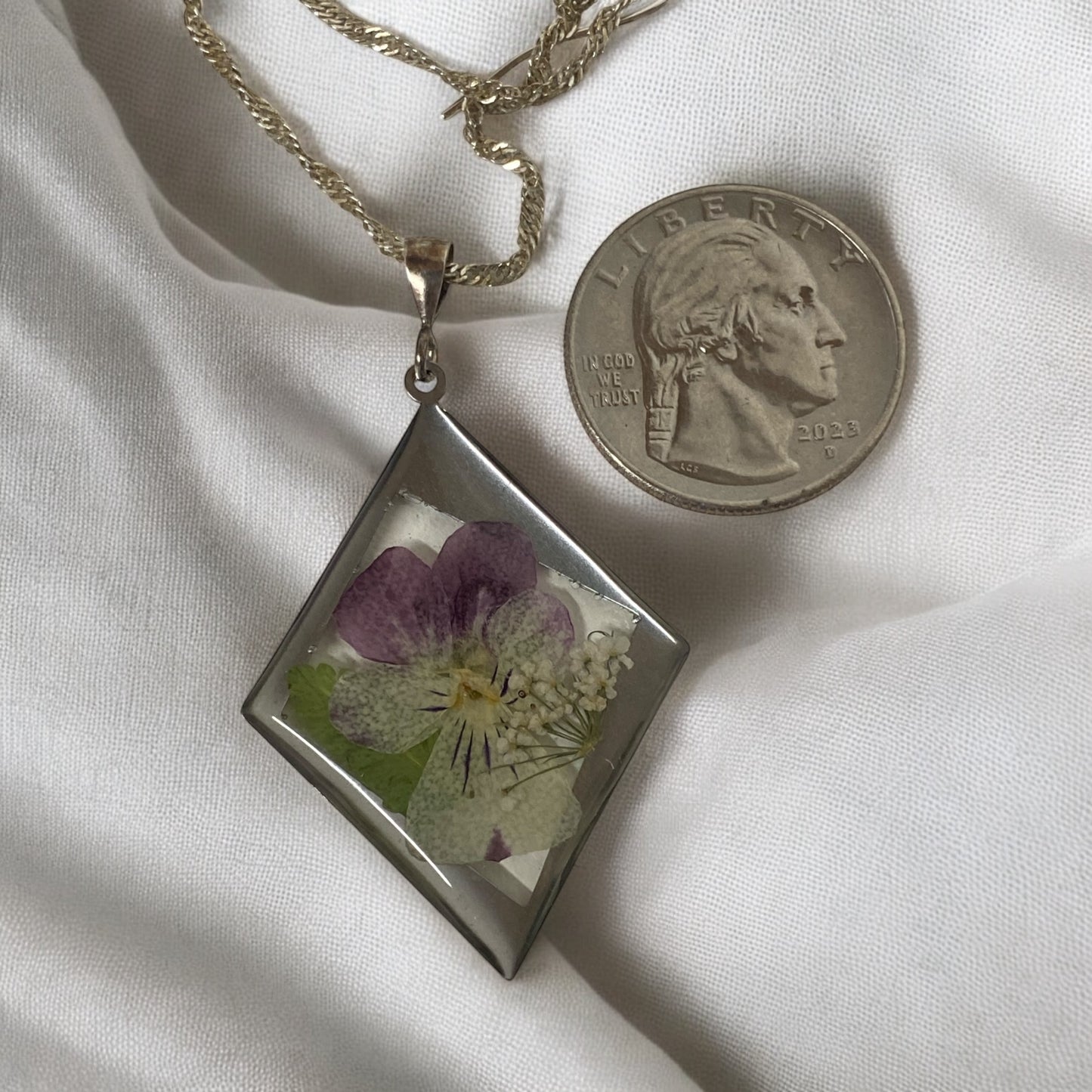 White and Purple Pansy with Fern and Pieces of Queen Anne’s Lace