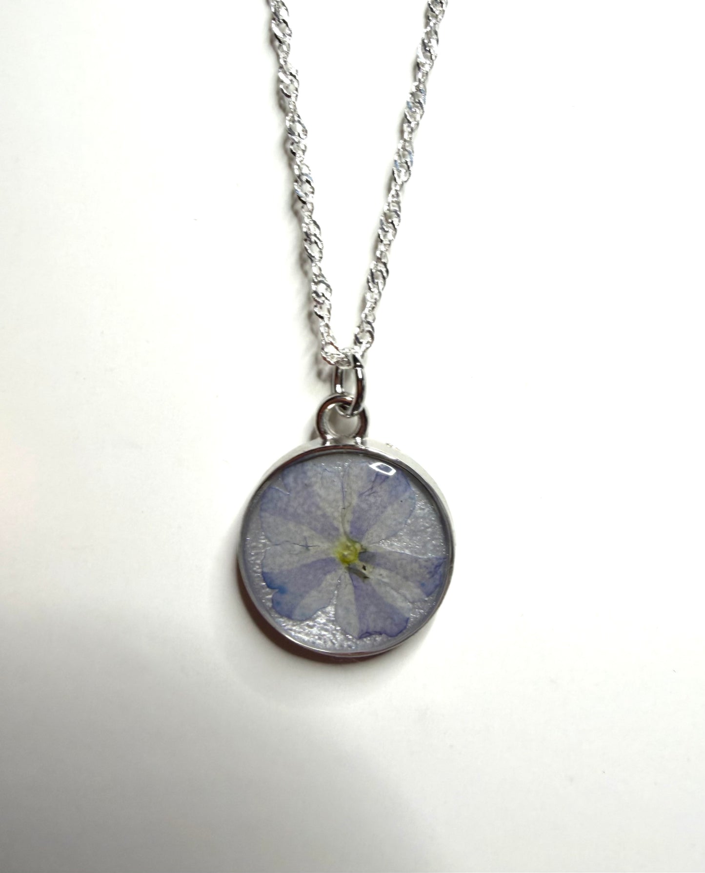 Opal Colored Mica Powder with a Soft Blue Verbena on top
