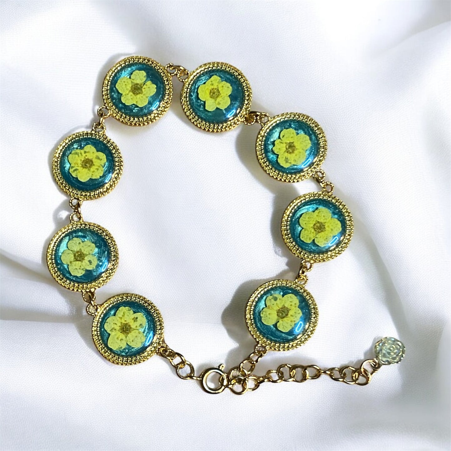 Gold Colored Bracelets with Teal Mica Powder