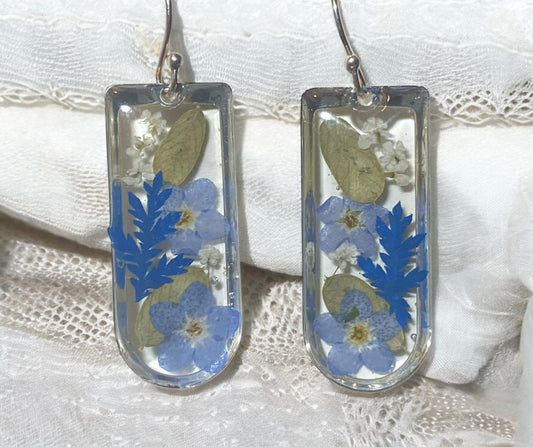 Blue dyed Fern with Blue Forget-Me-Nots with pieces of Queen Anne’s Lace and Dry Pressed Leaves