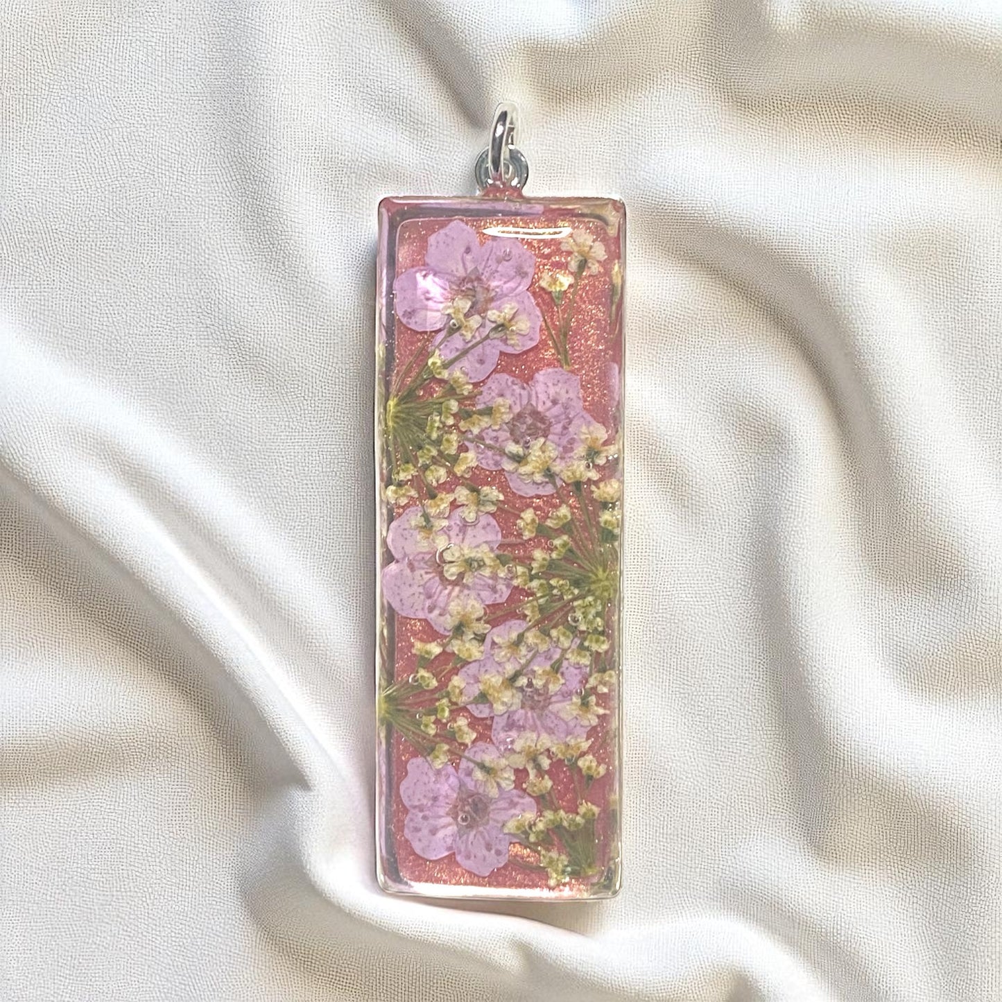Coral Pink Mica Powder Filled Bezel with Light Purple Plum Blossoms and Queen Anne’s Lace