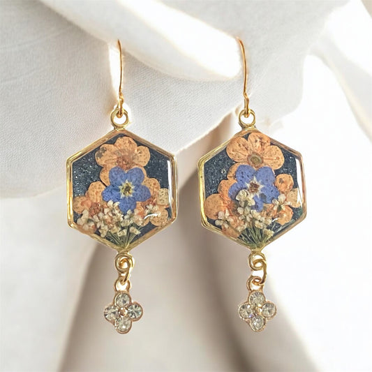 Black Colored Mica Powder with Queen Anne’s Lace, Orange Plum Blossoms, and Blue Forget-Me-Nots with a Rhinestone Charm