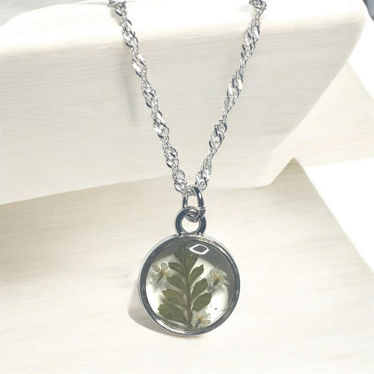 Silver Colored Dainty Necklace with Dry Pressed Fern and Pieces of Queen Anne’s Lace on a