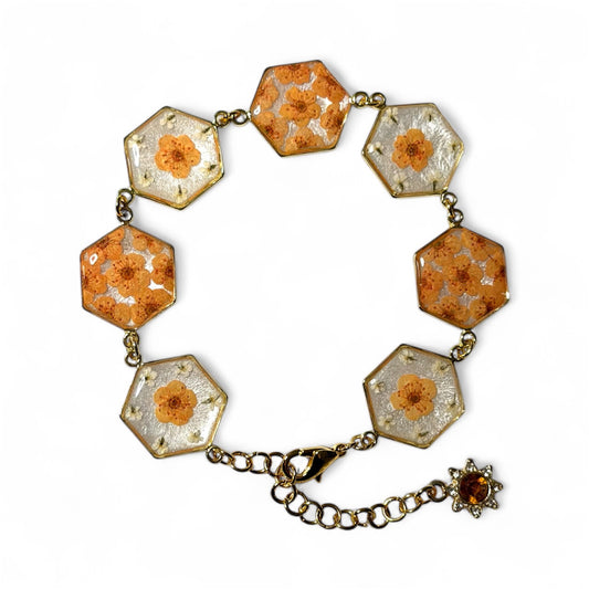 Gold Colored Bracelet with Orange Plum Blossoms and Pieces of Queen Anne’s Lace