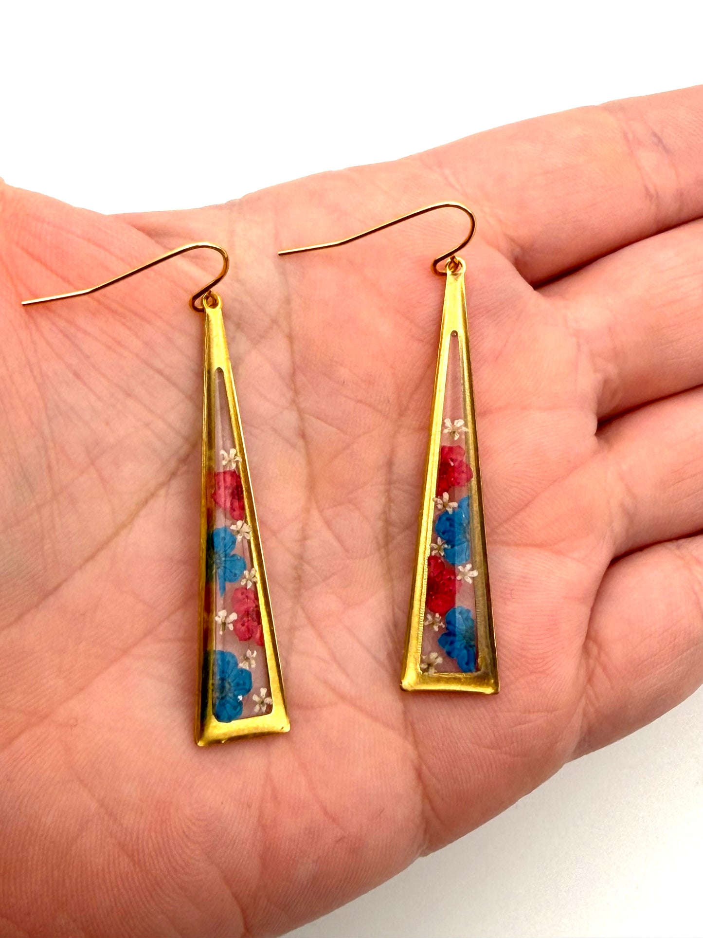 Red and Blue Plum Blossoms with Pieces of Queen Anne’s Lace