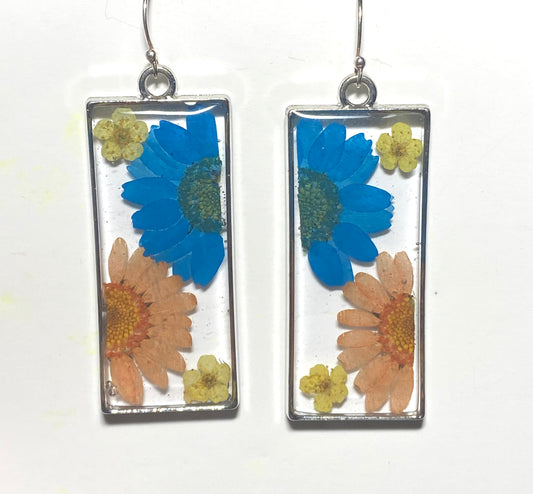 Split Blue and Orange Daisies with Yellow Plum Blossoms
