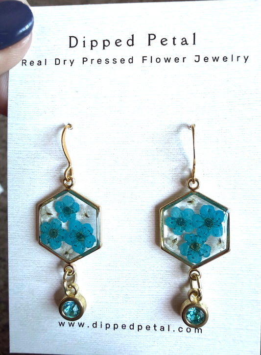 Teal Blue Colored Plum Blossoms and Pieces of Queen Anne’s Lace with a Teal Colored Charm