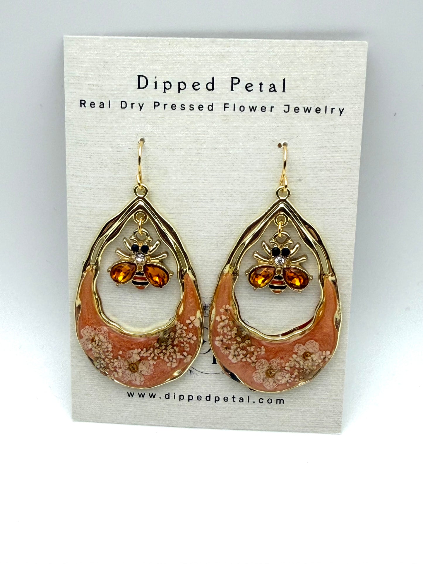 Orange Mica Powder, Plum Blossoms, and Queen Anne’s Lace with Bee Charms
