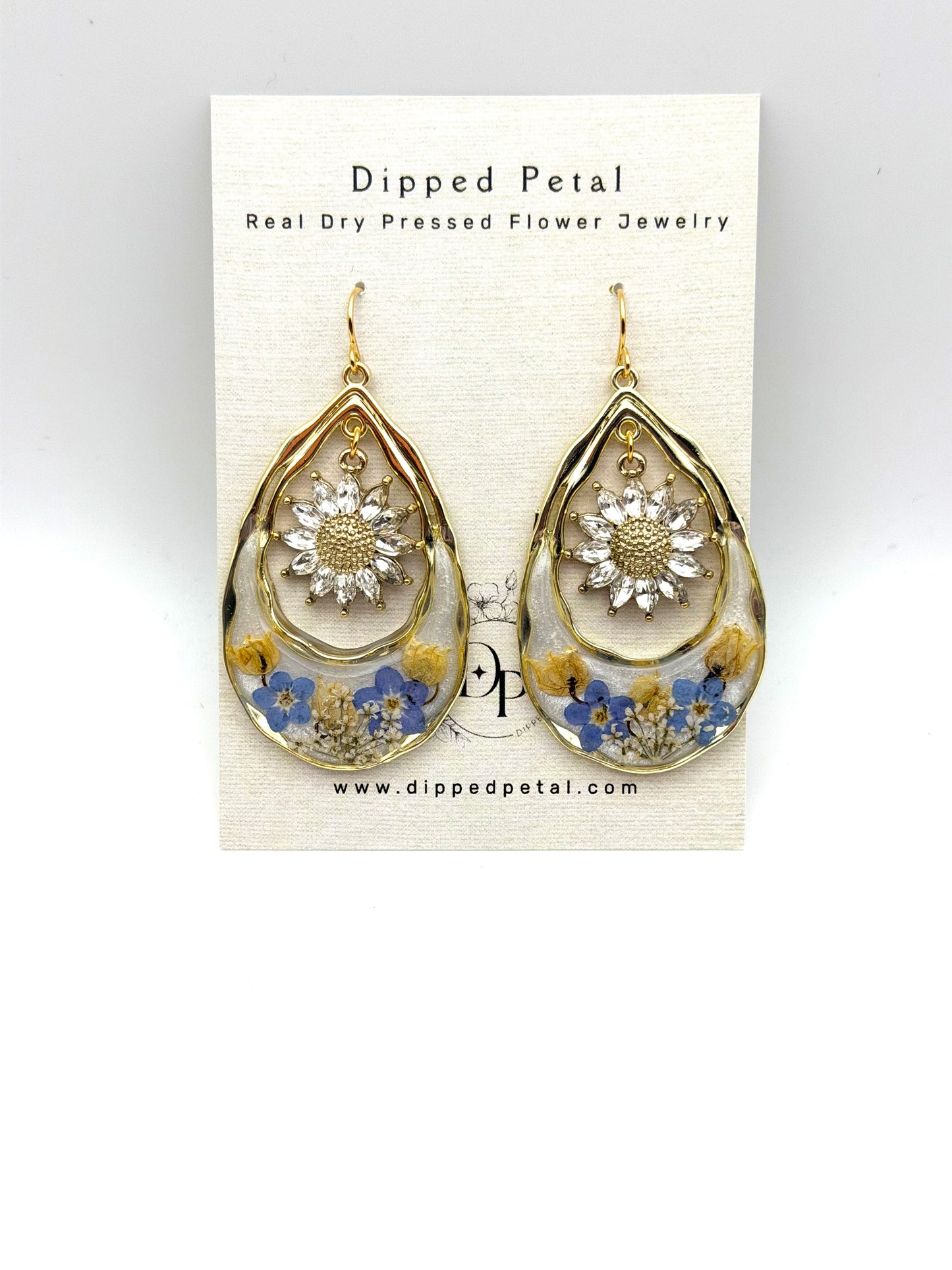 Opal Mica Powder, Forget-Me-Nots, Lily of the Valley, and Queen Anne’s Lace with Sunflower Charms