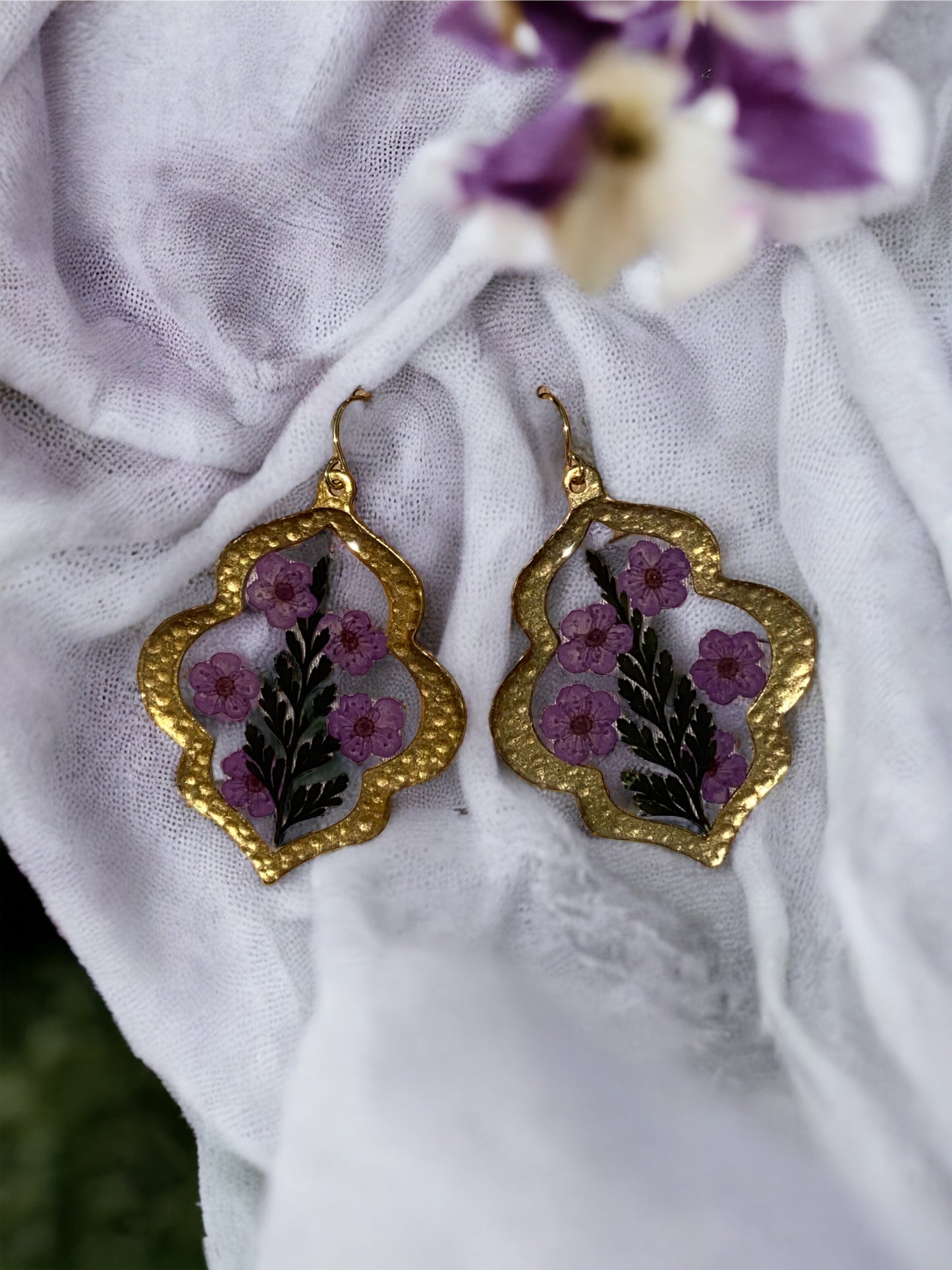 Black Dyed Fern with Purple Plum Blossoms Flowers set in a Brass Bezel