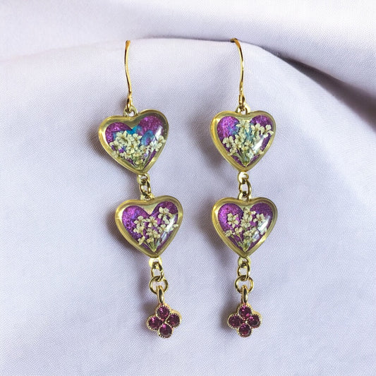Wisteria Purple Colored Mica Powder with Queen Anne’s Lace, Baby’s Breath and a Pink/Purple Rhinestone Charm