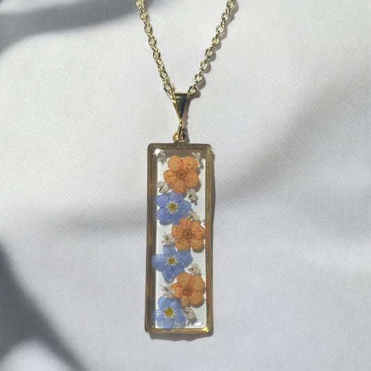 Orange Plum Blossoms, Blue Forget-Me-Nots with pieces of Queen Anne’s Lace