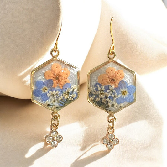 Opal Colored Mica Powder with Queen Anne’s Lace, Orange Plum Blossoms, and Blue Forget-Me-Nots with a Rhinestone Charm