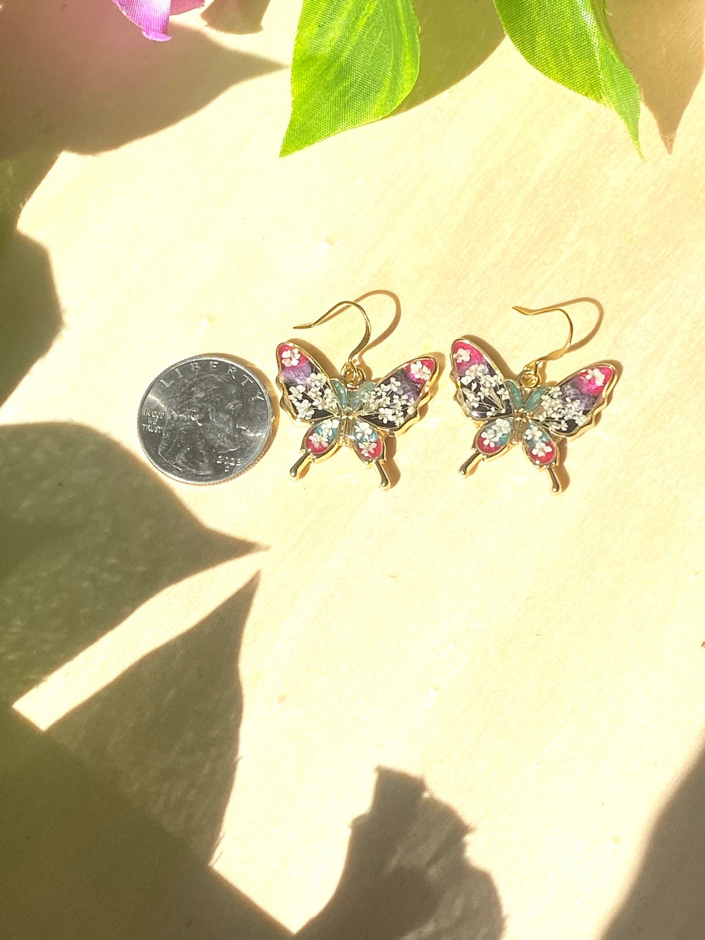 Butterfly Bezels filled with Mica Powder pieces of Queen Anne’s Lace,and  Purple Wild Flowers