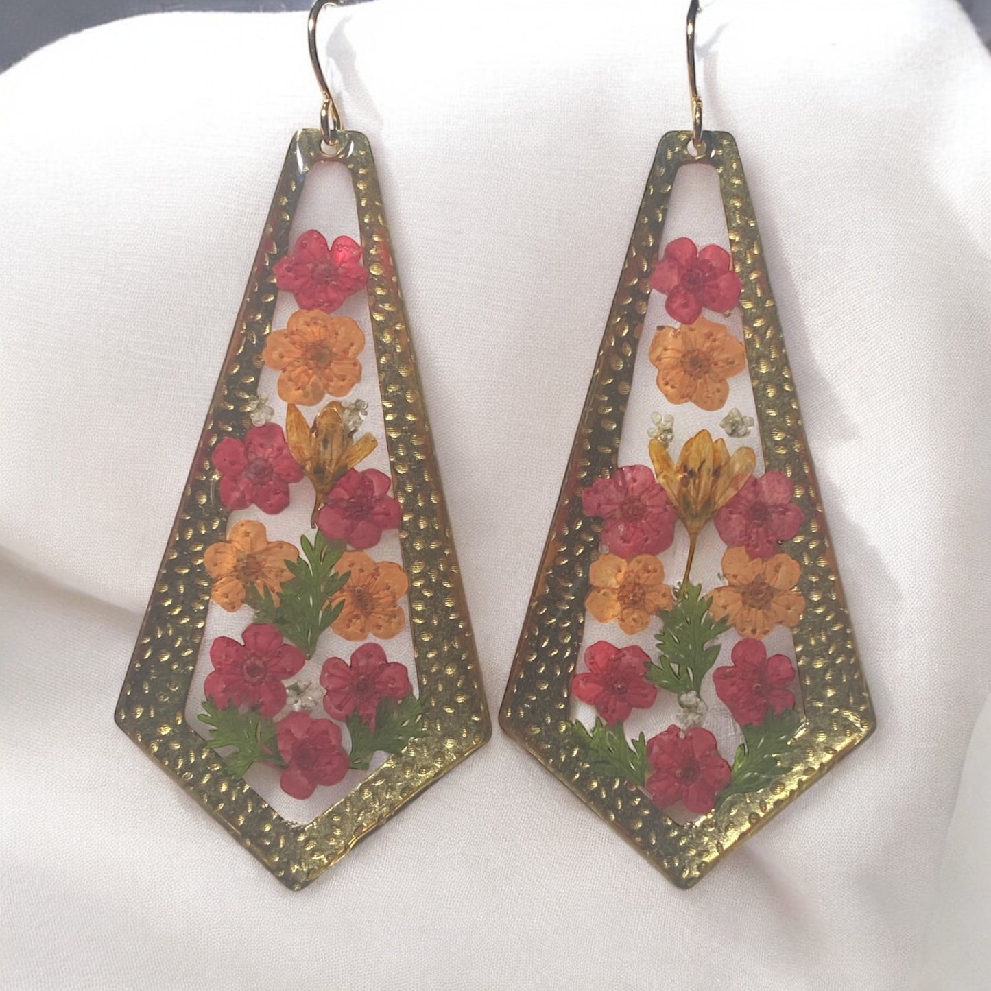 Red and Orange Plum Blossoms with pieces of Dry Pressed Fern and Orange Wild Flower