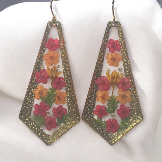 Red and Orange Plum Blossoms with pieces of Dry Pressed Fern and Orange Wild Flower