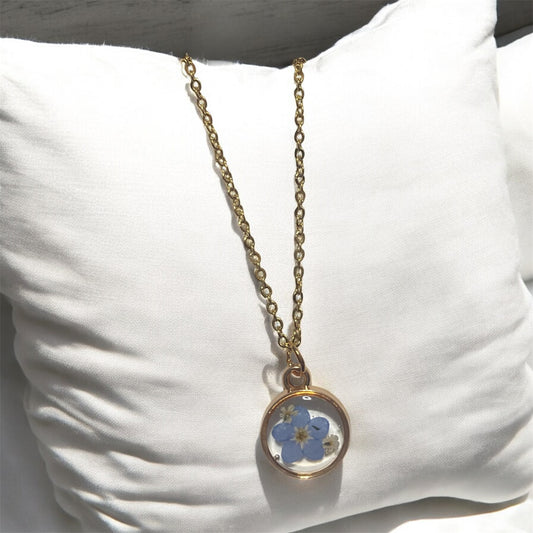 Dainty Rose Gold Bezel with Blue Forget-Me-Nots and Pieces of Queen Anne’s Lace on a Brass chain