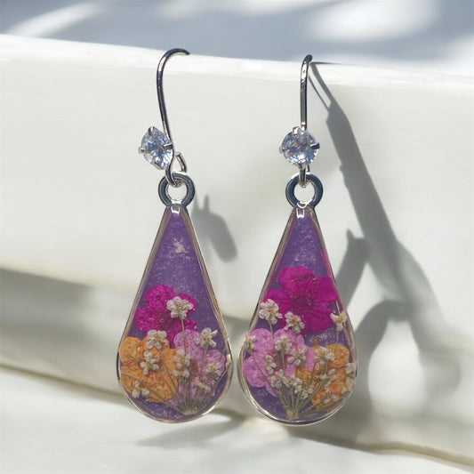 Purple Mica Powder with Hot Pink, Light Pink and Orange Plum Blossoms with Pieces of White Queen Anne’s Lace