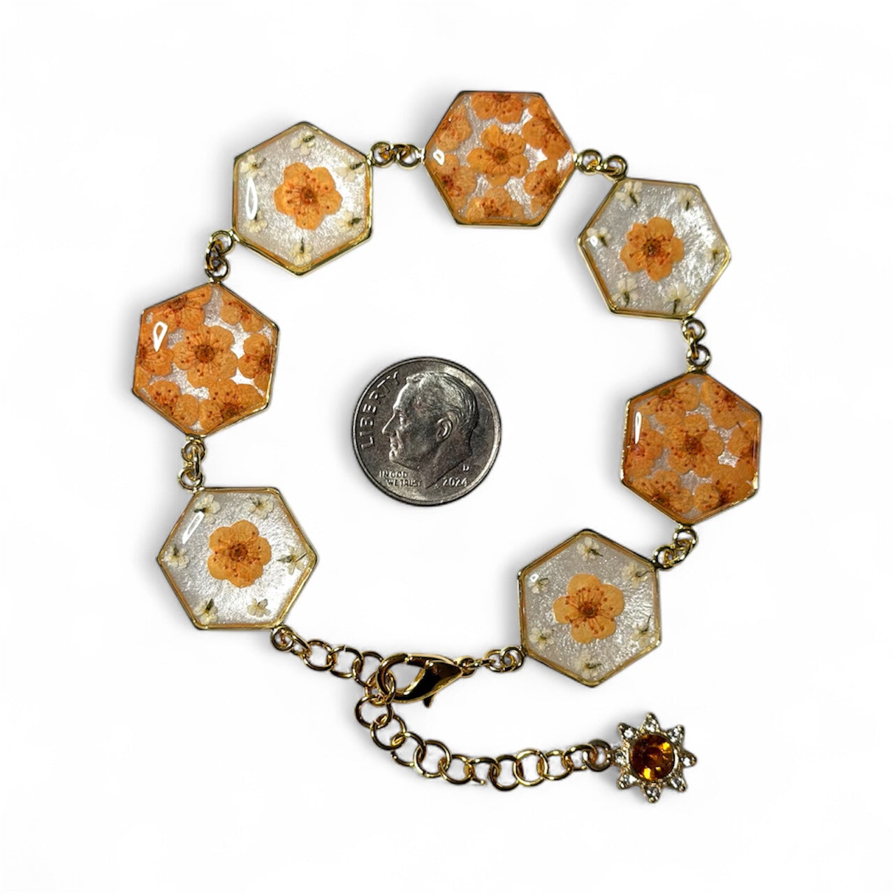 Gold Colored Bracelet with Orange Plum Blossoms and Pieces of Queen Anne’s Lace