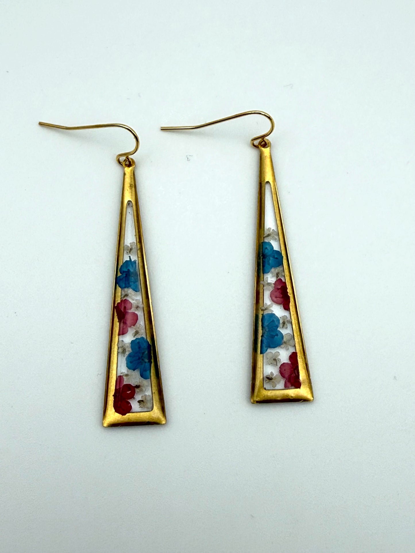 Red and Blue Plum Blossoms with Pieces of Queen Anne’s Lace