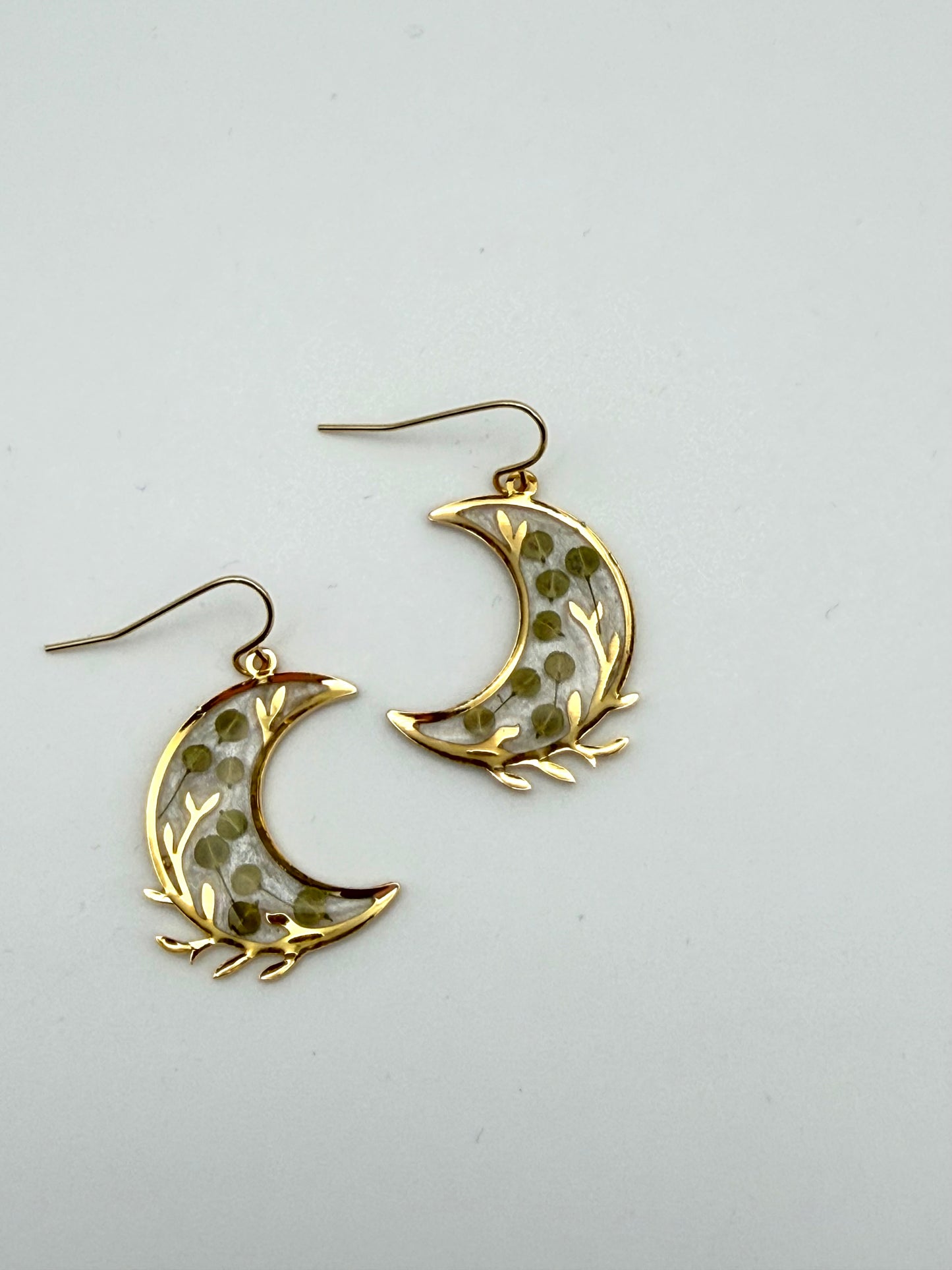 Gold Plated Crescent Moons filled with Opal Mica Powder and Pieces of Pepperweed
