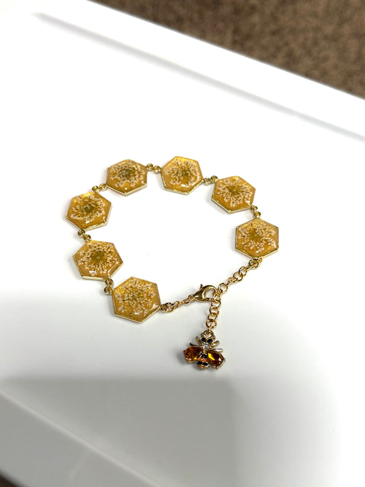 Gold Colored Bracelet with Gold Colored Mica Powder, and Queen Anne’s Lace