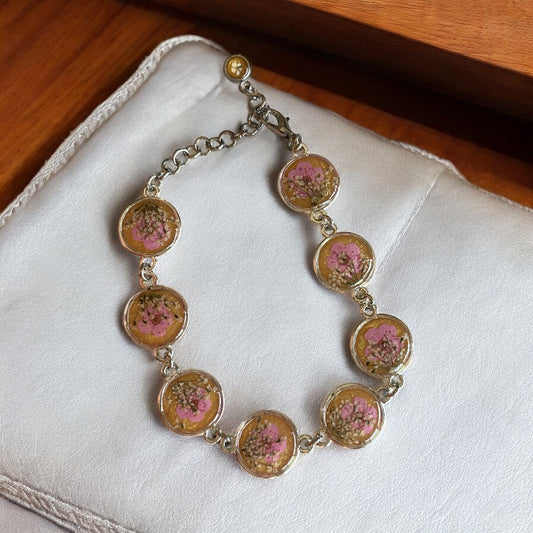 Gold Mica Powder with Pink Plum Blossoms and pieces of  Queen Anne’s Lace