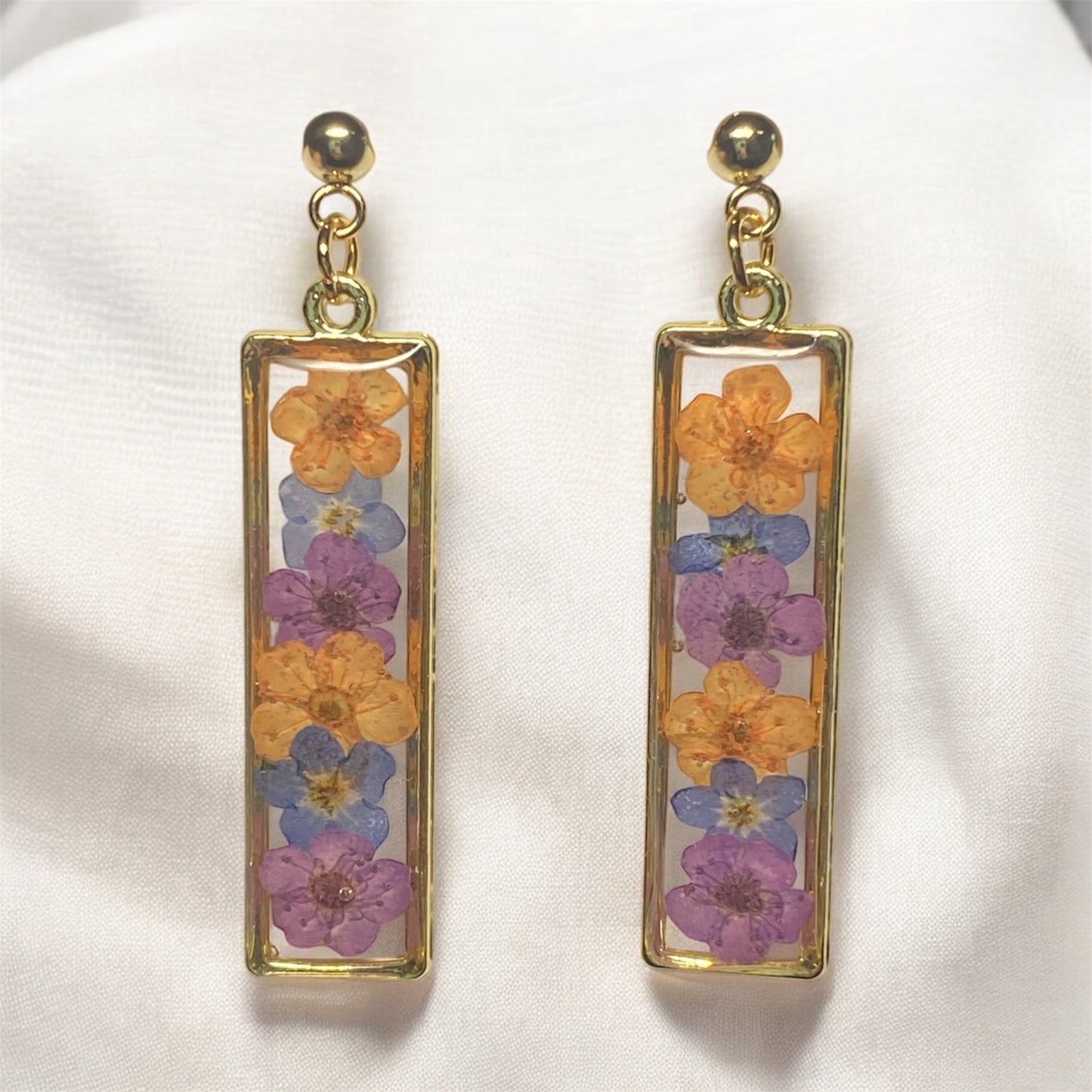 Purple and Orange Plum Blossoms with Blue Forget-Me-Nots