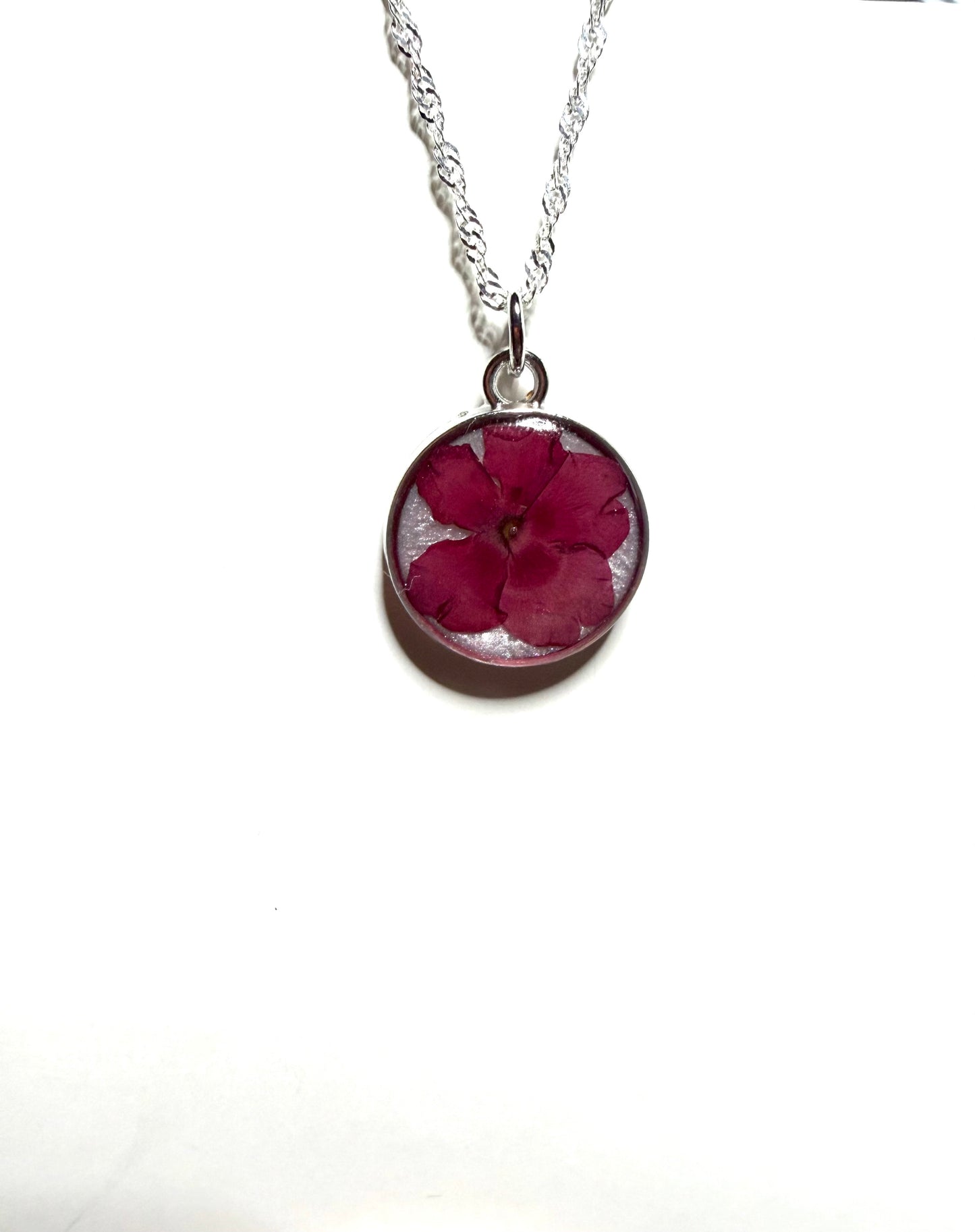 Opal Colored Mica Powder with a Red Verbena on top