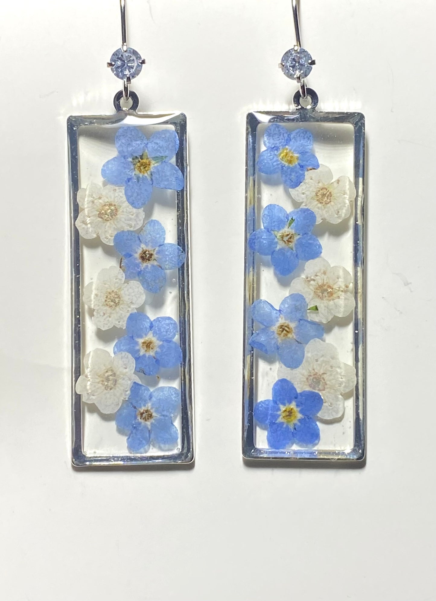 Blue Forget-Me Nots with White Plum Blossom Flowers