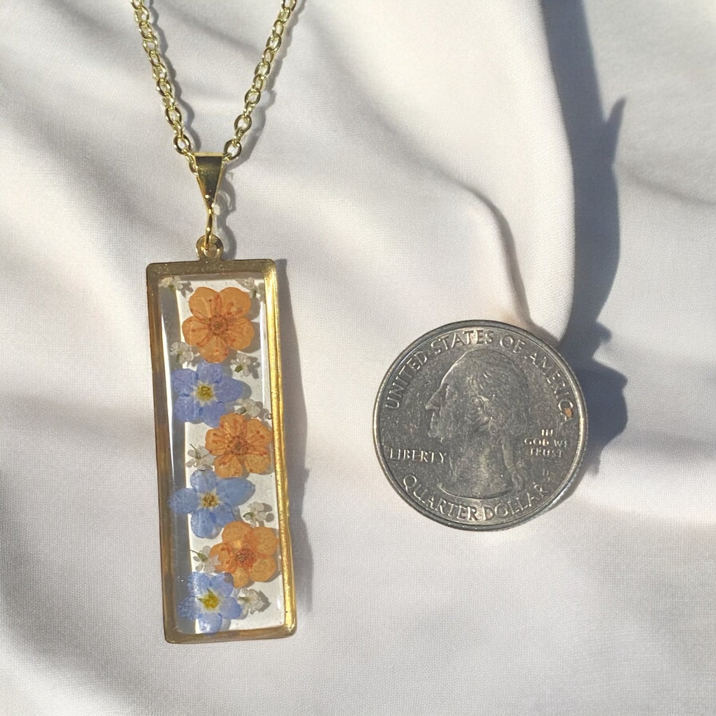 Orange Plum Blossoms, Blue Forget-Me-Nots with pieces of Queen Anne’s Lace