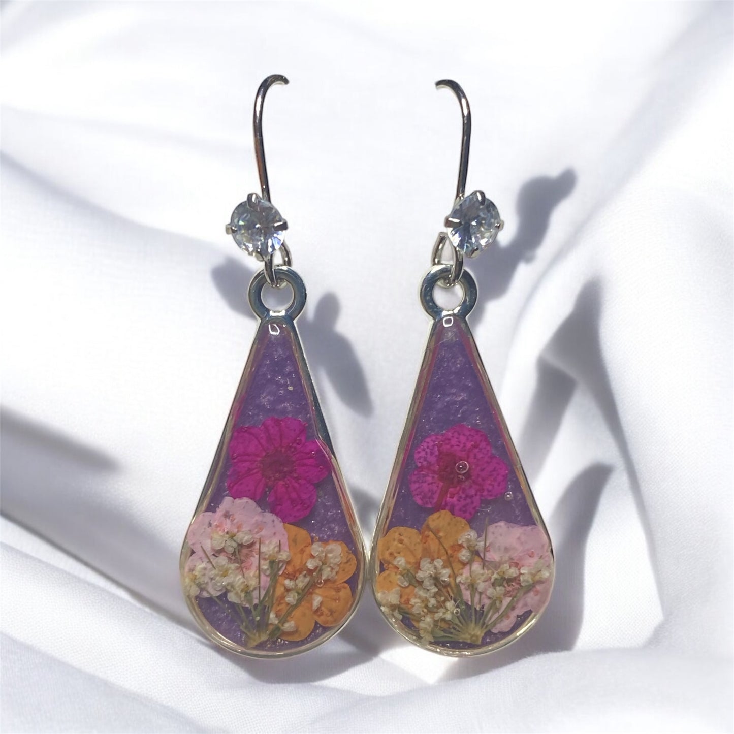 Purple Mica Powder with Orange, Hot and Light Pink Plum Blossoms, and Pieces of Queen Anne’s Lace