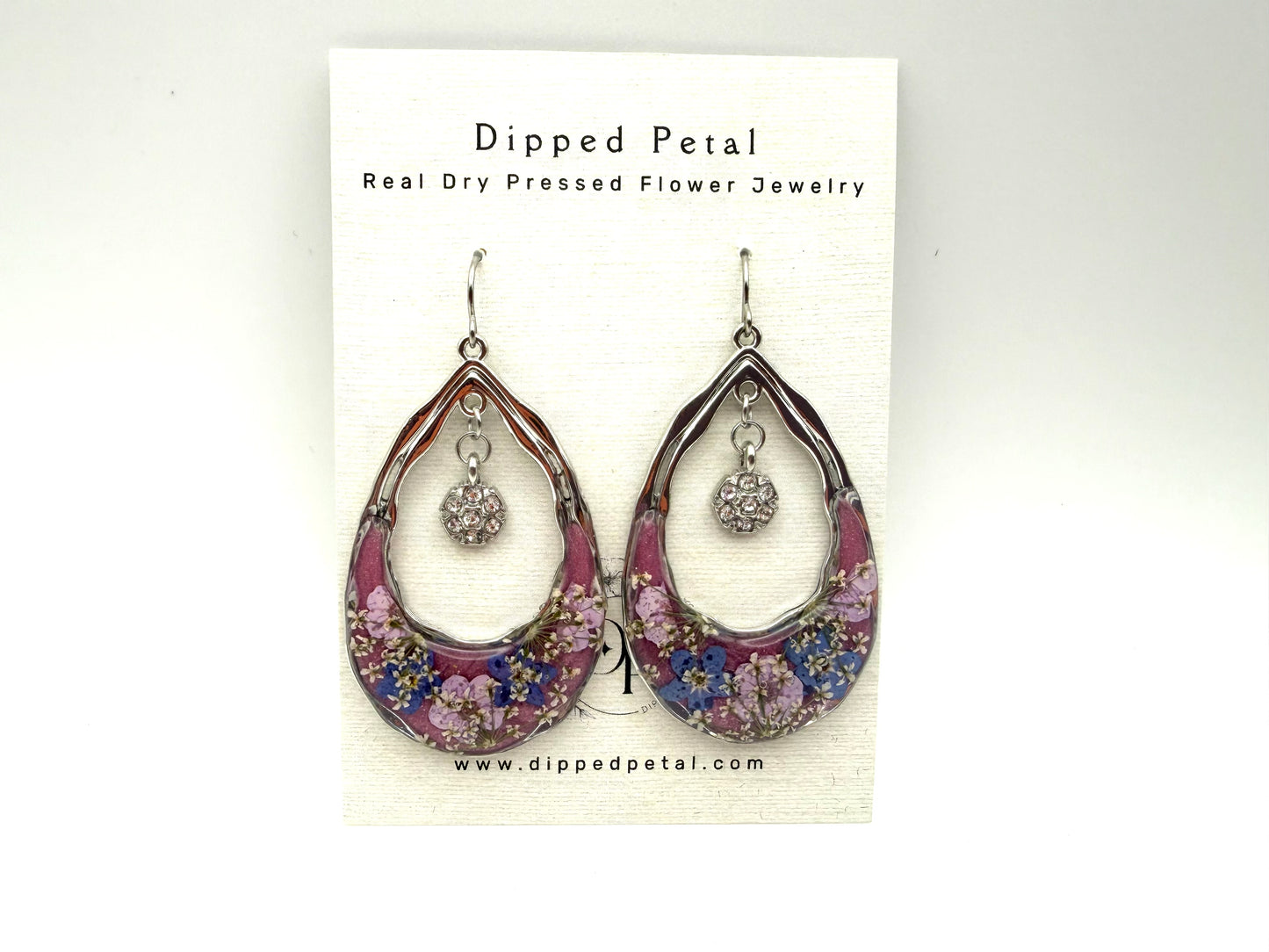 Mauve Mica Powder with Forget-Me-Nots, Pink Plum Blossoms, and Queen Anne’s Lace with dangling charms
