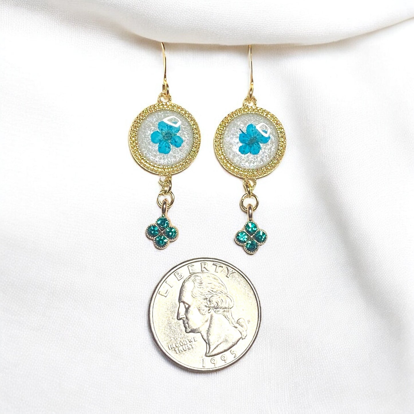 Opal-/White Colored Mica Powder with Teal Plum Blossoms and a Green Rhinestone Charm