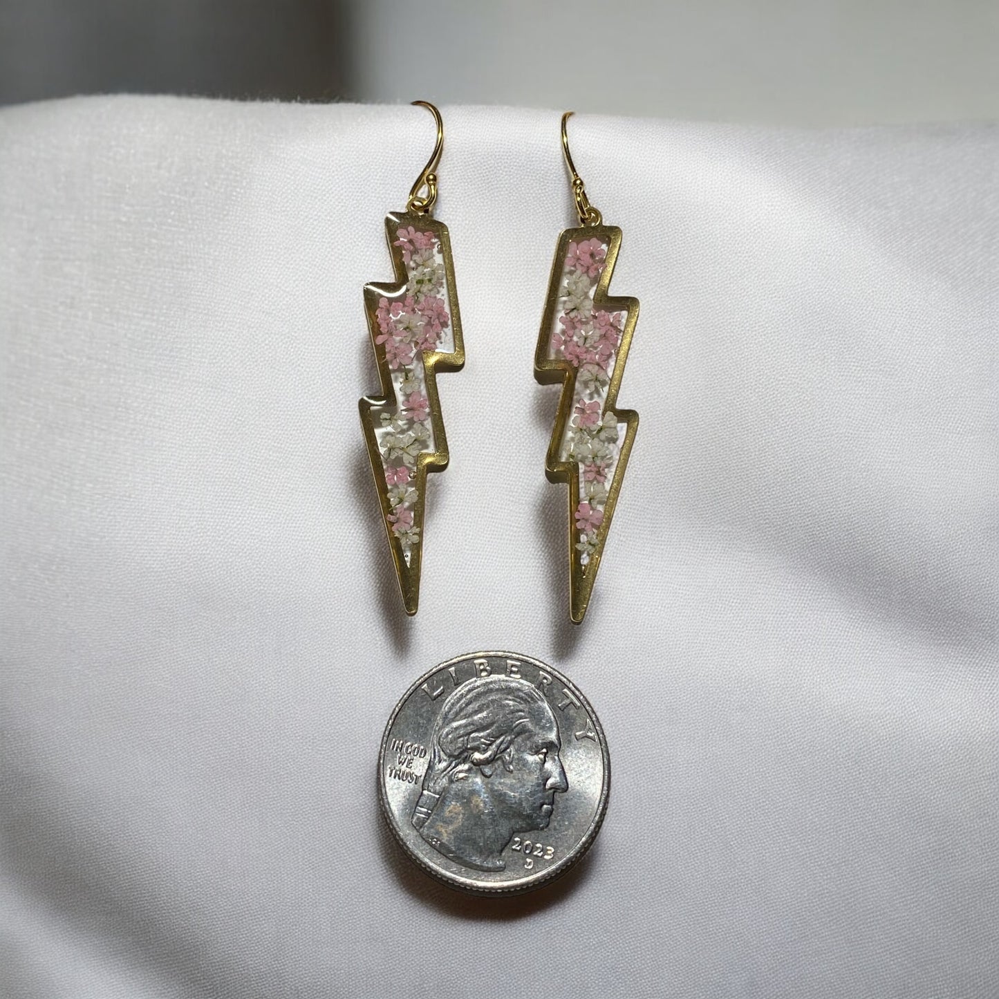 Lightening Bolts filled with pieces of Pink and White Queen Anne’s Lace