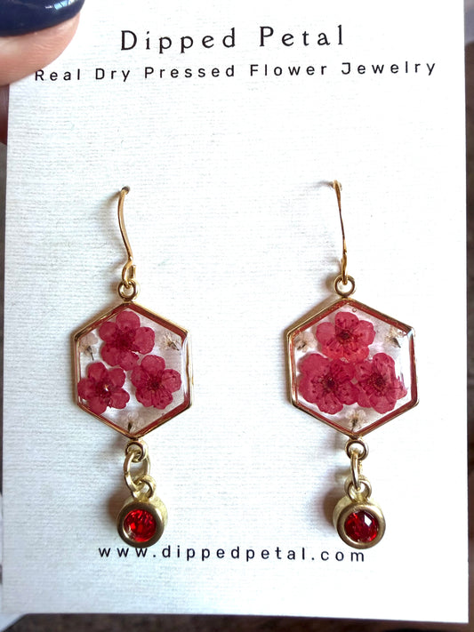 Red Plum Blossoms and Pieces of Queen Anne’s Lace with a Red Charm