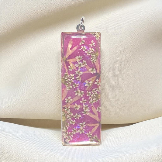 Wisteria Pink Colored Mica Powder Background with Queen Anne’s Lace and Split Verbena